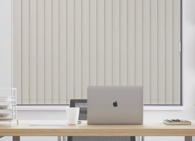 Boss room with office blinds and macbook