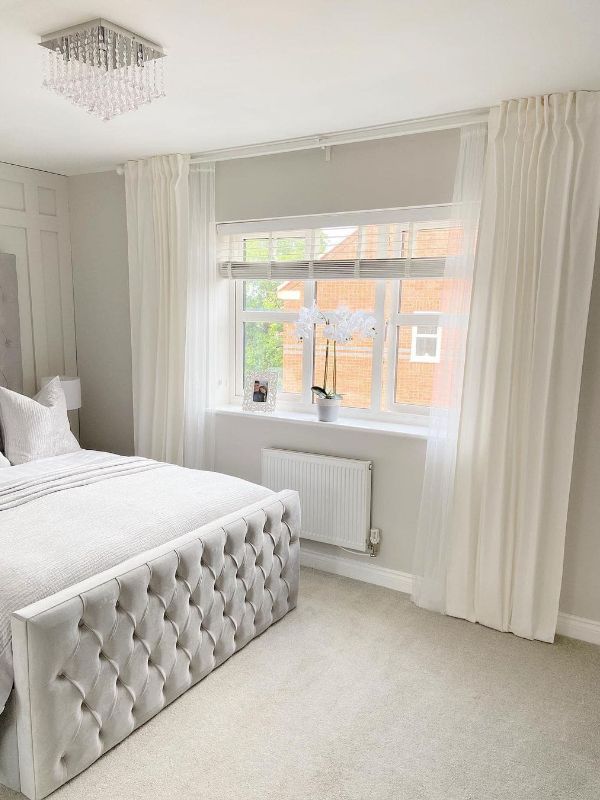 modern bedroom with lavish curtains