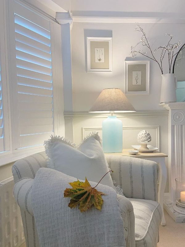 white style bedroom with white window shutters