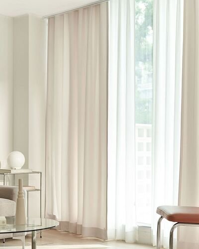 Cream and chiffon curtains in home