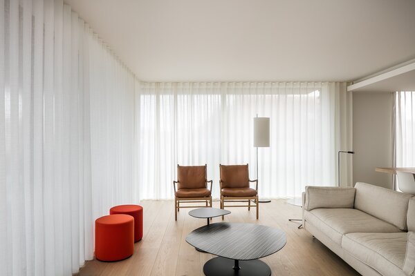 Minimalist room with sheer curtains