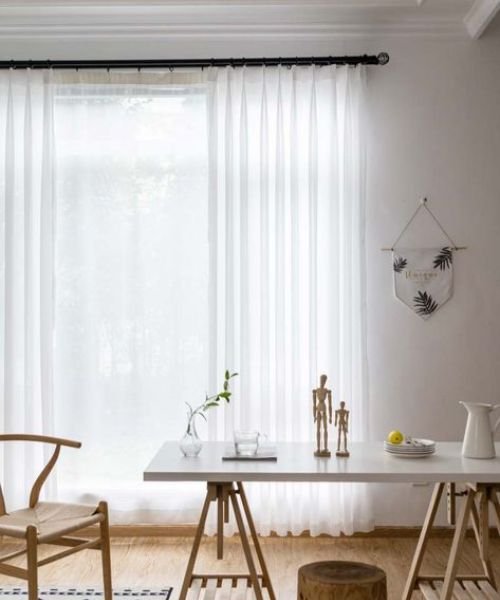 Bright room with sheer curtains