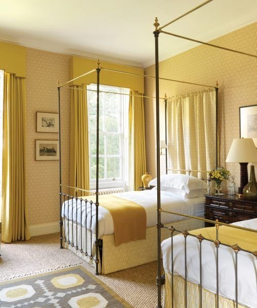 Cozy twin bedroom with yellow