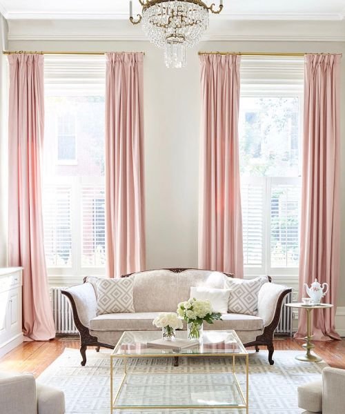 Elegant living room with pink curtains