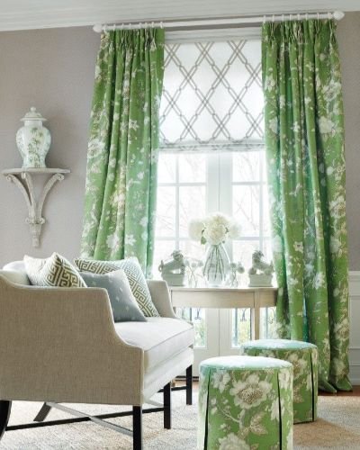 Living room with green floral curtains