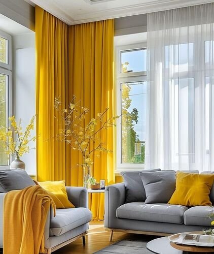 Sunny curtains highlight modern gray furniture