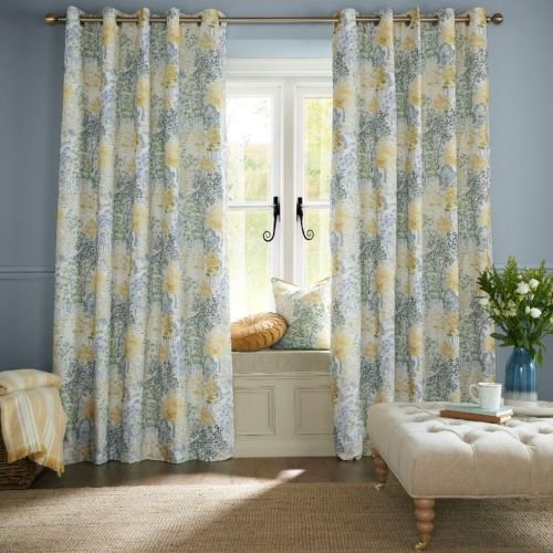 Floral curtains framing bright window