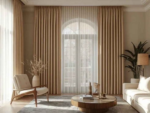 Beige room-darkening curtains in a modern Dubai living room